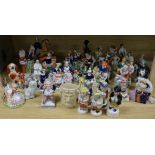 A collection of assorted Staffordshire figures