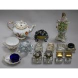 A group of assorted glass inkwells, a Dresden porcelain teapot and sundries