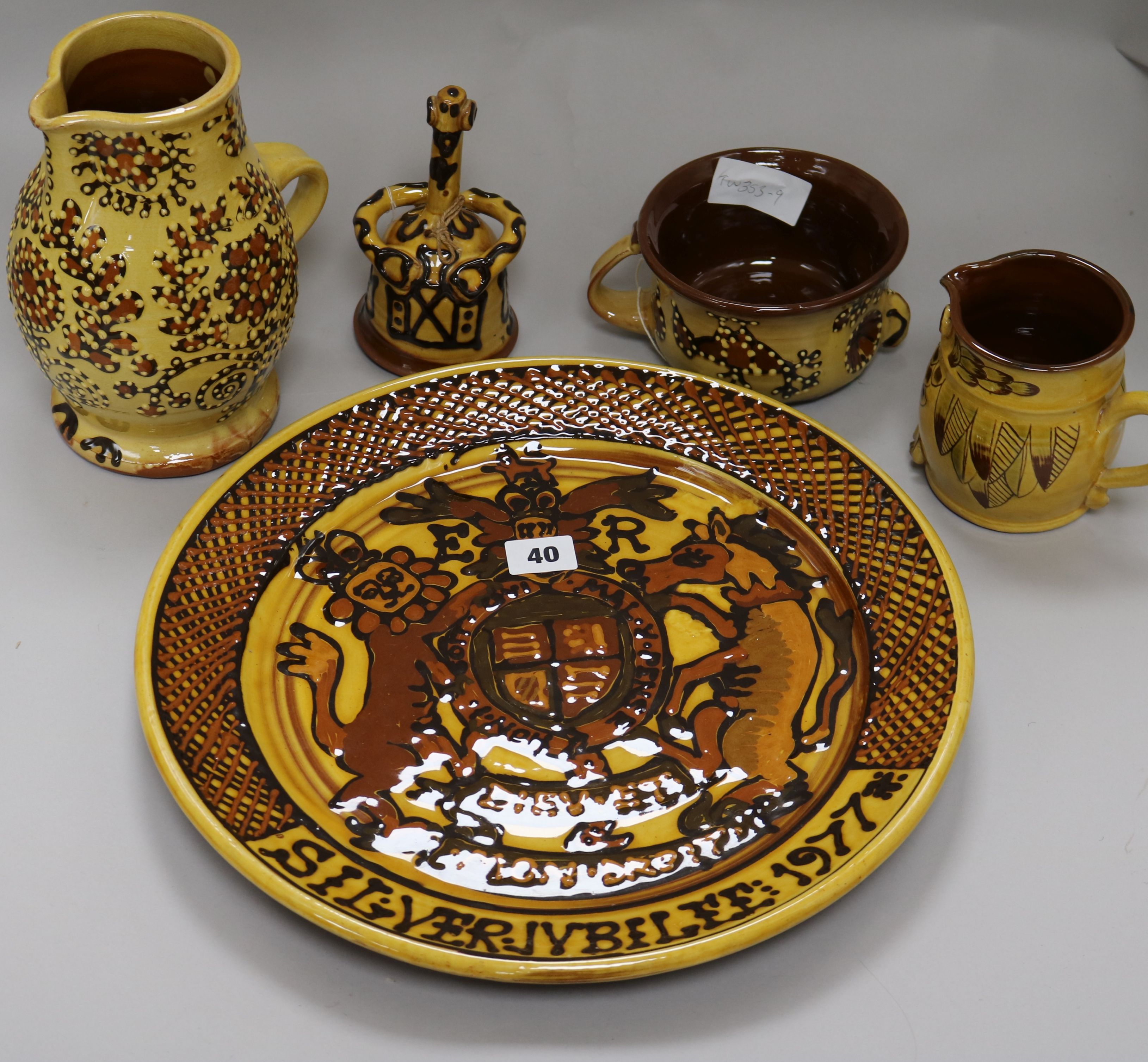 A group of Mary Wondrausch (1923-2016) slipware, including a charger, 36cm