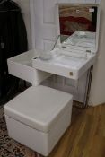 A Carlo Ubinati white Ciarly Vanity, 1970s, with rising top, fitted mirrors and revolving centre