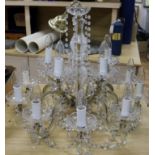 A 20th century cut and moulded glass chandelier, with beaded drops diameter 63cm drop 48cm