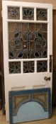An Art Nouveau ' Tree of Life' stained glass panelled door and another panel. w.86cm