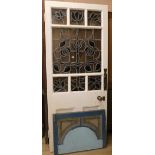 An Art Nouveau ' Tree of Life' stained glass panelled door and another panel. w.86cm