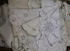 A large quantity of table cloths, napkins etc