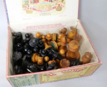 A Jaques Staunton boxwood and ebony chess set, knights and rooks stamped with a crown and the