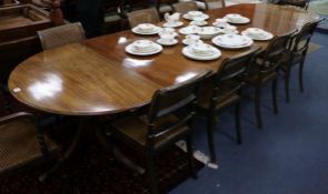 A Regency style mahogany triple pillar dining table width 346cm