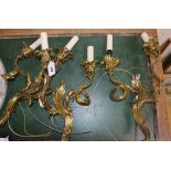 A set of three gilt brass twin branch wall lights, recently re-wired height 39cm