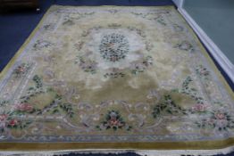 A yellow ground large rug 368cm x 275cm