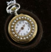 An early 20th century silver, yellow metal and enamel fob watch with split pearl set bezel, the back