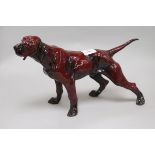 An Italian flambe glazed model of a pointer H.25cm.From the estate of the late Sheila Farebrother.