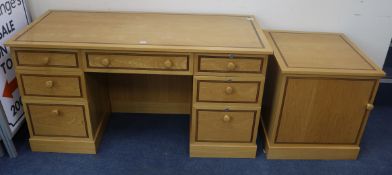 A modern oak pedestal desk and a matching file cabinet desk W.150cm cabinet W.63cmFrom the estate of