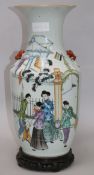 A Chinese famille rose baluster vase, wood stand height 42cm