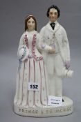 A Staffordshire pottery group 'The Prince and Princess' height 30cm