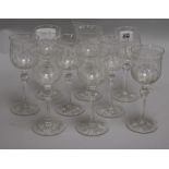 A set of nine etched drinking glasses