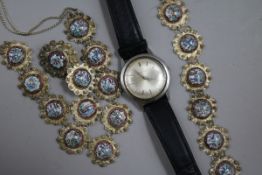 A gentleman's Eterna-Matic wrist watch and a Persian white metal and enamel parure.