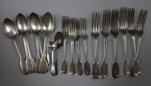 A harlequin part canteen of Victorian silver fiddle pattern flatware and a later Old English pattern