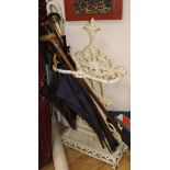 A Victorian white painted cast iron stick and umbrella stand