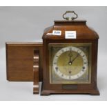 An Elliot mahogany eight day striking and chiming mantel clock, on bracket