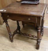 An oak side table W.67cm