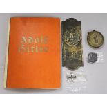 A group of WWII German items including a book on Adolf Hitler