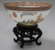 A Chinese egg shell porcelain bowl, wood stand and box