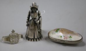 A Norwegian 830 standard silver napkin ring, a plated "Dutch girl" hand bell and a mounted shell