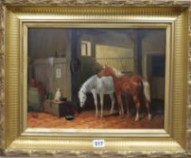 K G, oil on board, horses in a stable monogrammed, 28 x 38cm