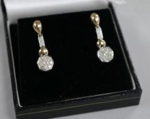 A pair of modern 9ct gold and diamond cluster drop earrings, overall 26mm.