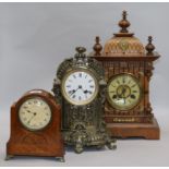 Three mantel clocks, including one oak, one brass and one Swiss tallest 42cm