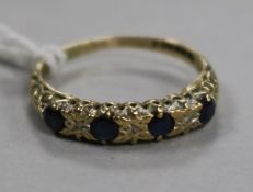 A 9ct gold, sapphire and diamond half hoop ring, size K.