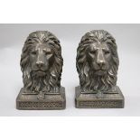 A bronzed resin horse and two lion bookends height 19cmFrom the estate of the late Sheila
