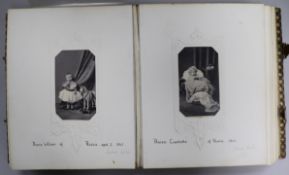 A late Victorian album containing photographs including Queen Victoria and Prince Albert and other