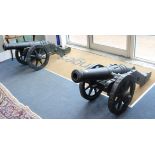 A pair of cast iron model cannons W.60cmFrom the estate of the late Sheila Farebrother.