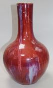 A Chinese sang de boeuf vase height 41cm (a.f.)