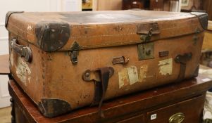 A leather suitcase, formerly the property of John Profumo, bearing label 'Major Profumo, Hyde Park