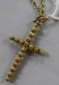 A Victorian yellow metal cross pendant on a yellow metal chain, pendant 45mm.