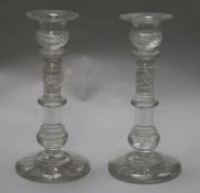 A pair of cut glass candlesticks 25cm.