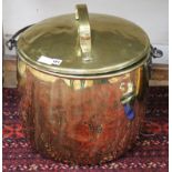 A large Victorian brass pail and cover, with wrought iron handle height 45cm