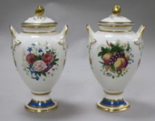 A pair of Minton vases and covers height 18cmFrom the estate of the late Sheila Farebrother.