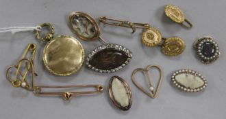 A small group of mainly 19th century jewellery including a mourning brooch with ivory panel, seed