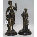 Two bronzed figures height 44cm