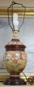 A Victorian floral and fruit painted pottery table lamp