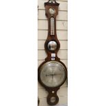 A Regency mahogany wheel barometer W.31cm