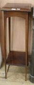 An Edwardian satinwood banded mahogany two tier jardiniere stand W.30cm