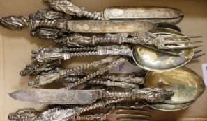 Six plated apostle spoons, six plate apostle fork and five plated apostle knives.