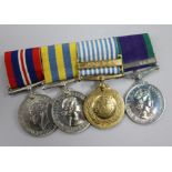 A WWI/QEII Korea medal group to S.Sgt L.W. Ledger Int-Corps including GSM with Boreo Clasp, UN Korea