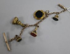A 9ct gold bracelet, hung with five assorted fobs including four seals.