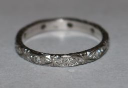 A platinum and diamond set eternity ring, size N.From the estate of the late Sheila Farebrother.