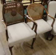 A 1930's cane beech armchair and one other similar chair