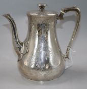 A Victorian silver coffee pot by William Hunter, of tapering cylindrical form, with engraved